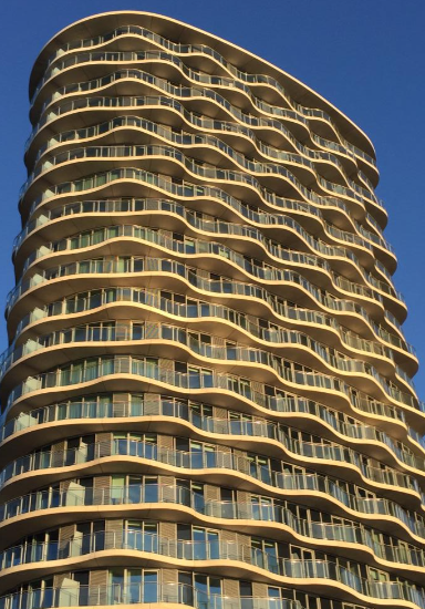 Tidal Basin — Curved balcony facade and curtain wall to a riverside high-rise.