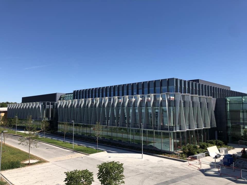 ARM LIMITED TECHNOLOGY — Business park recladding with GRC panels and curtain walling.